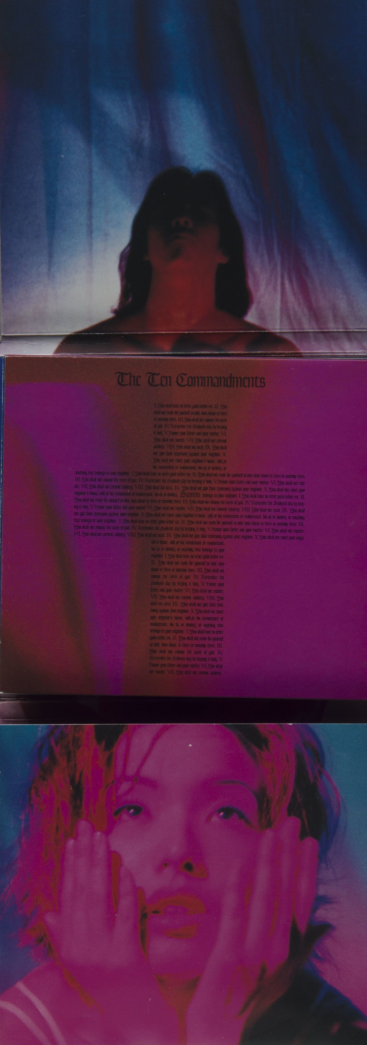Vertical two-page spread of Sammi Cheng’s CD album Decalogue. Its image has an overall grainy effect. The top page has black text shaped as a cross on a fuschia background. The bottom page has a frontal headshot of the singer with magenta and blue tones. She looks upward, with her hands resting on her cheeks.